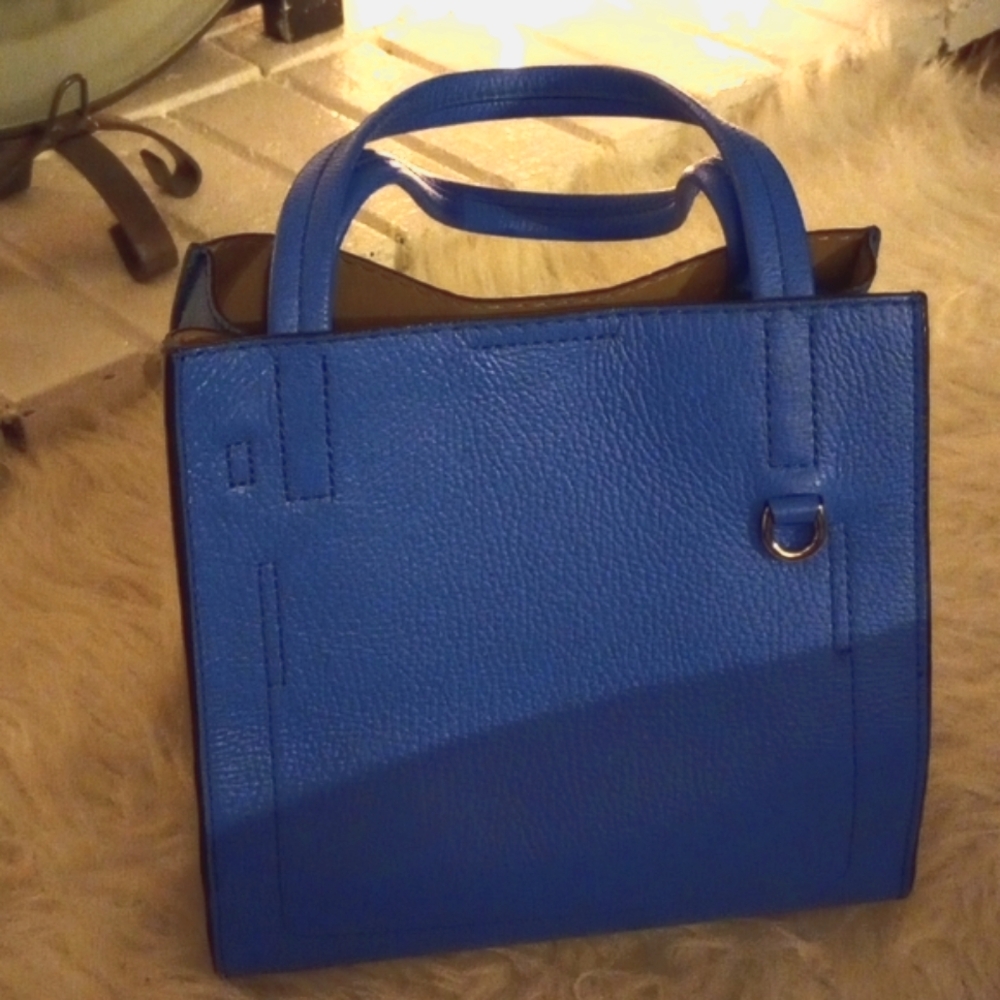 Banana Republic Blue Arm / Shoulder Bag. Side Snaps to expand. Leather